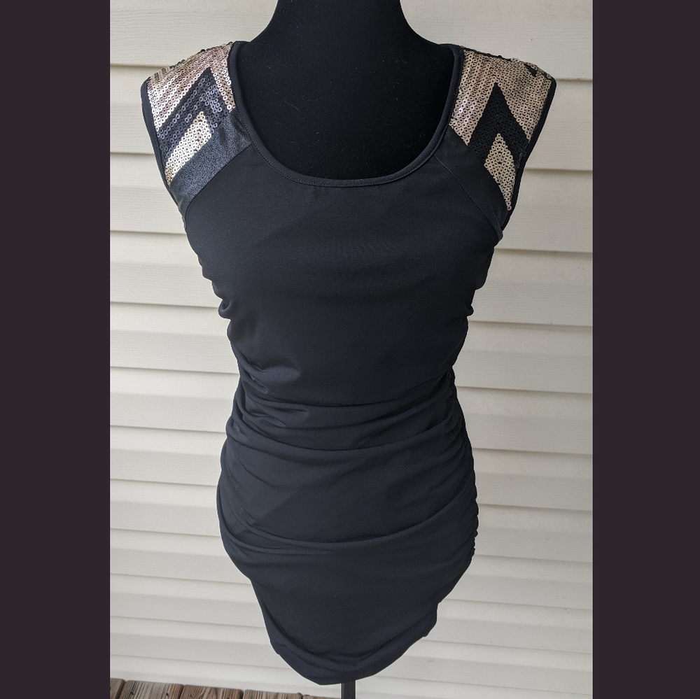 Black fitted dress with sequins